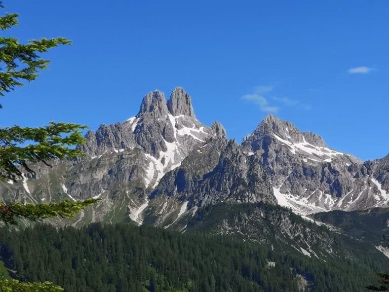 A stunning close-up of the Bischofsmütze mountain, one of the most iconic peaks near Salzburg, Austria. This scenic alpine landscape is a highlight for families embarking on hut-to-hut hikes in the Dachstein region.