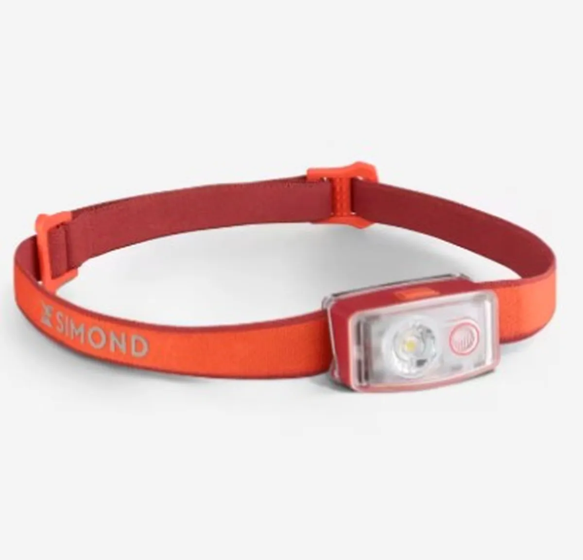 Red Simond headlamp with adjustable strap, lightweight and practical for hiking and hut-to-hut trekking.