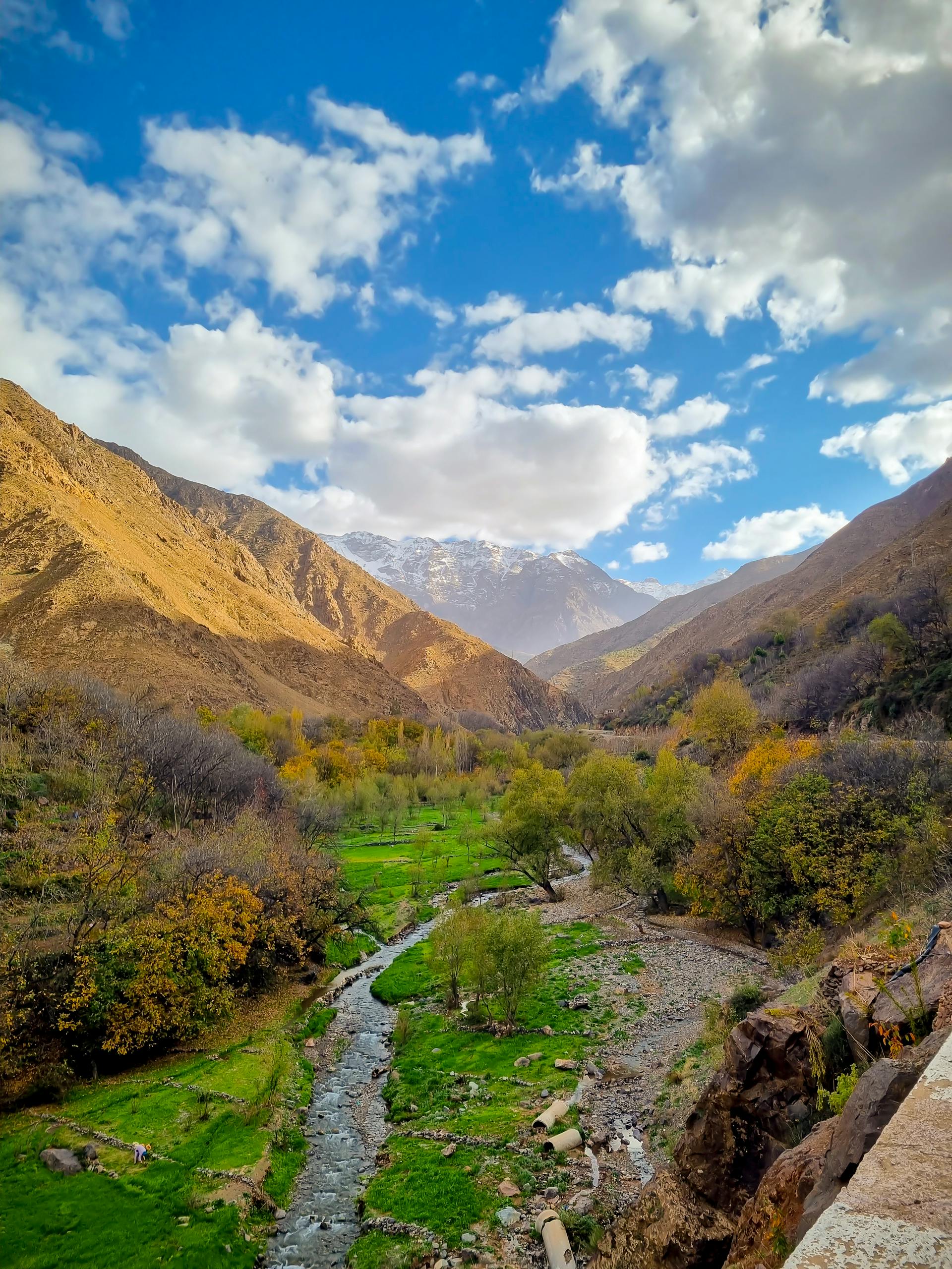 Beautiful mountain landscape in Imlil, Morocco with clear skies and vibrant greenery; a great spot for an Easter break.